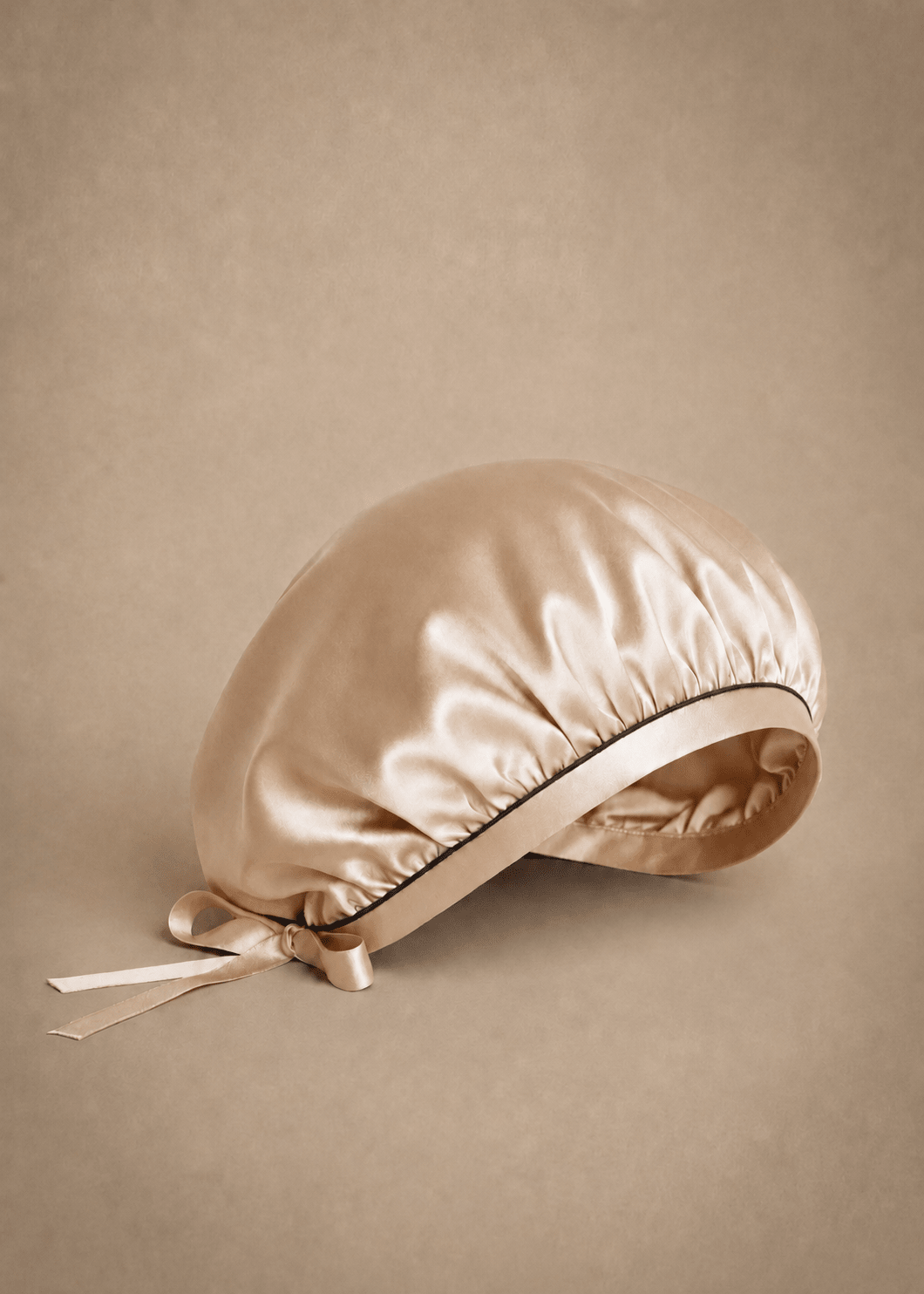 Champagne silk hair bonnet with midnight blue trim by Miaveriana
